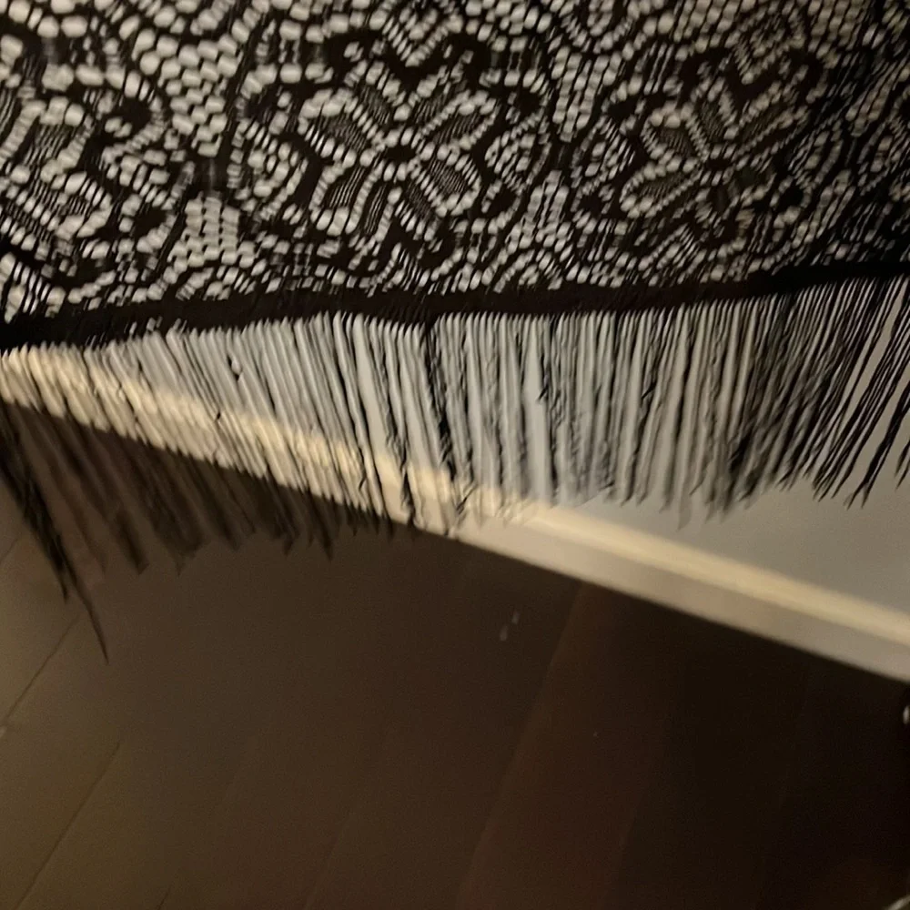 Unknown maker size one size fits all.  Black shawl no arm holes.